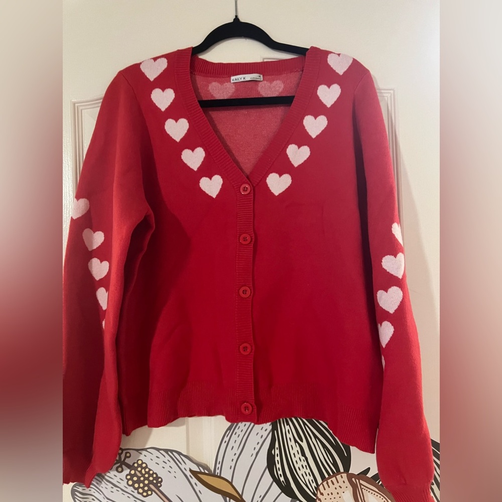 Valentine’s Day red button up sweater with hearts on sleeves